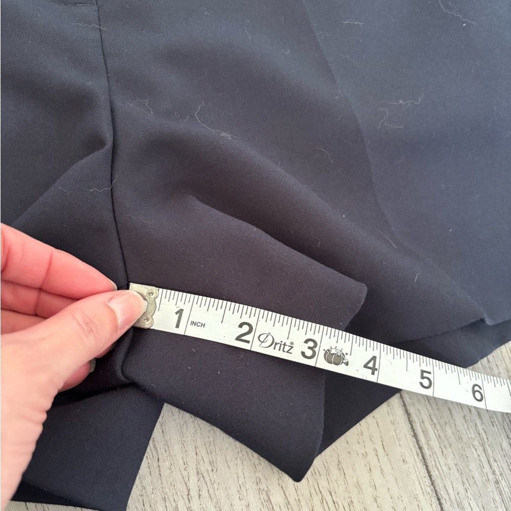 H&M shorts in high waisted navy. EUC with pockets and silver tone button detail. - Picture 9 of 9